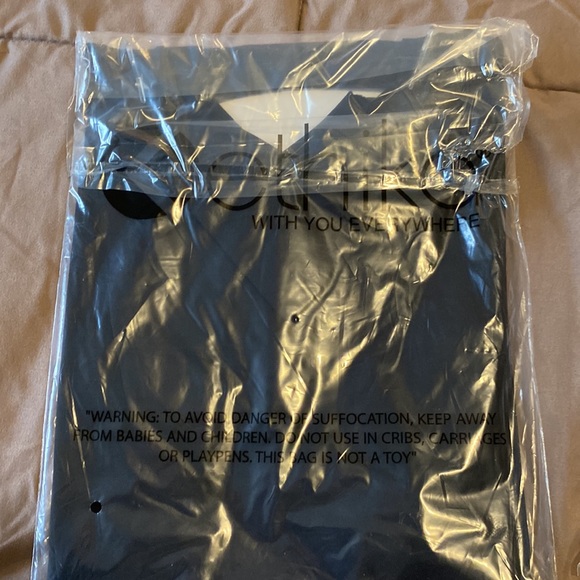 Ethika. TAKE All FOUR ITEMS FOR $50 - Picture 4 of 9